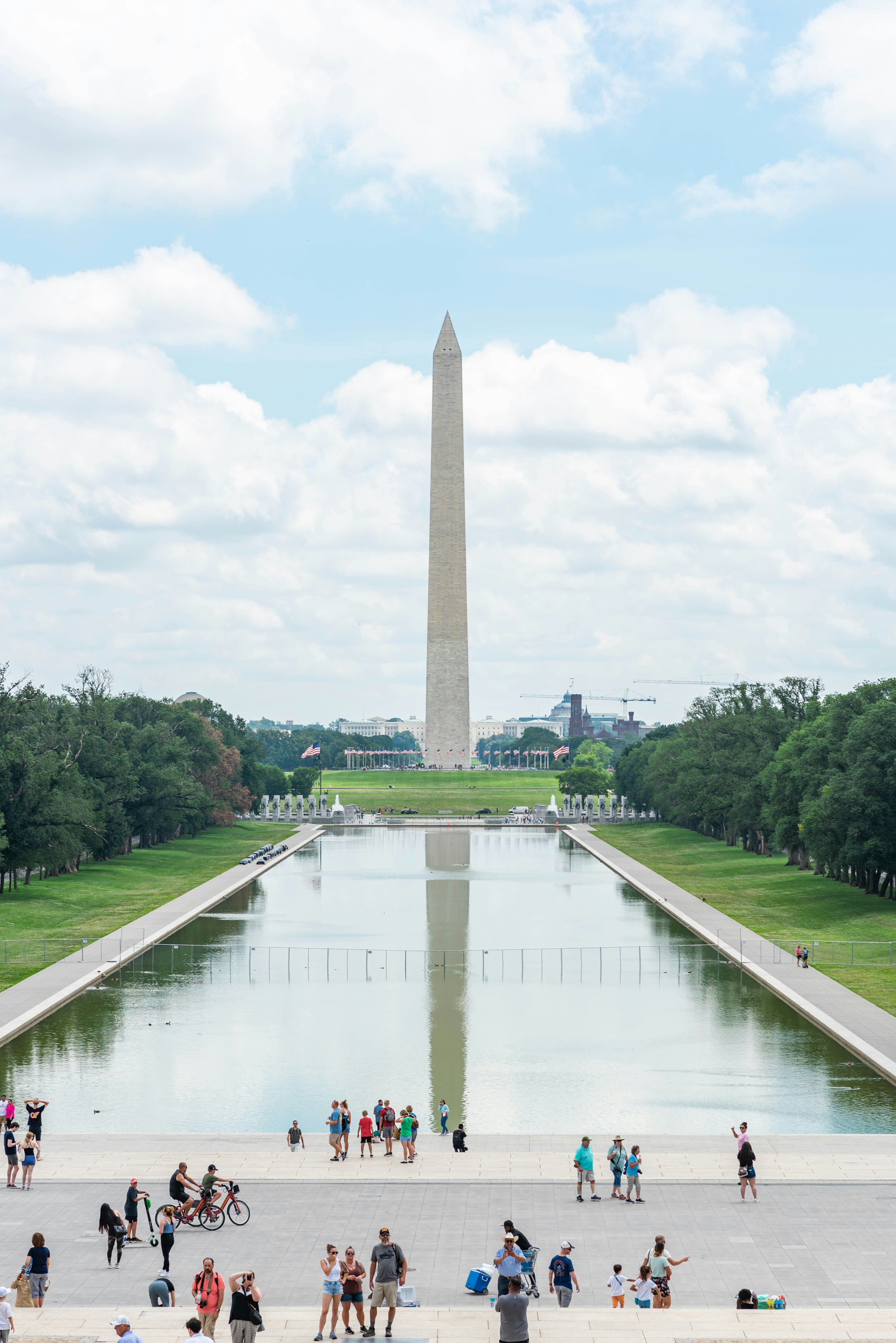 washington monument under white clouds during daytime